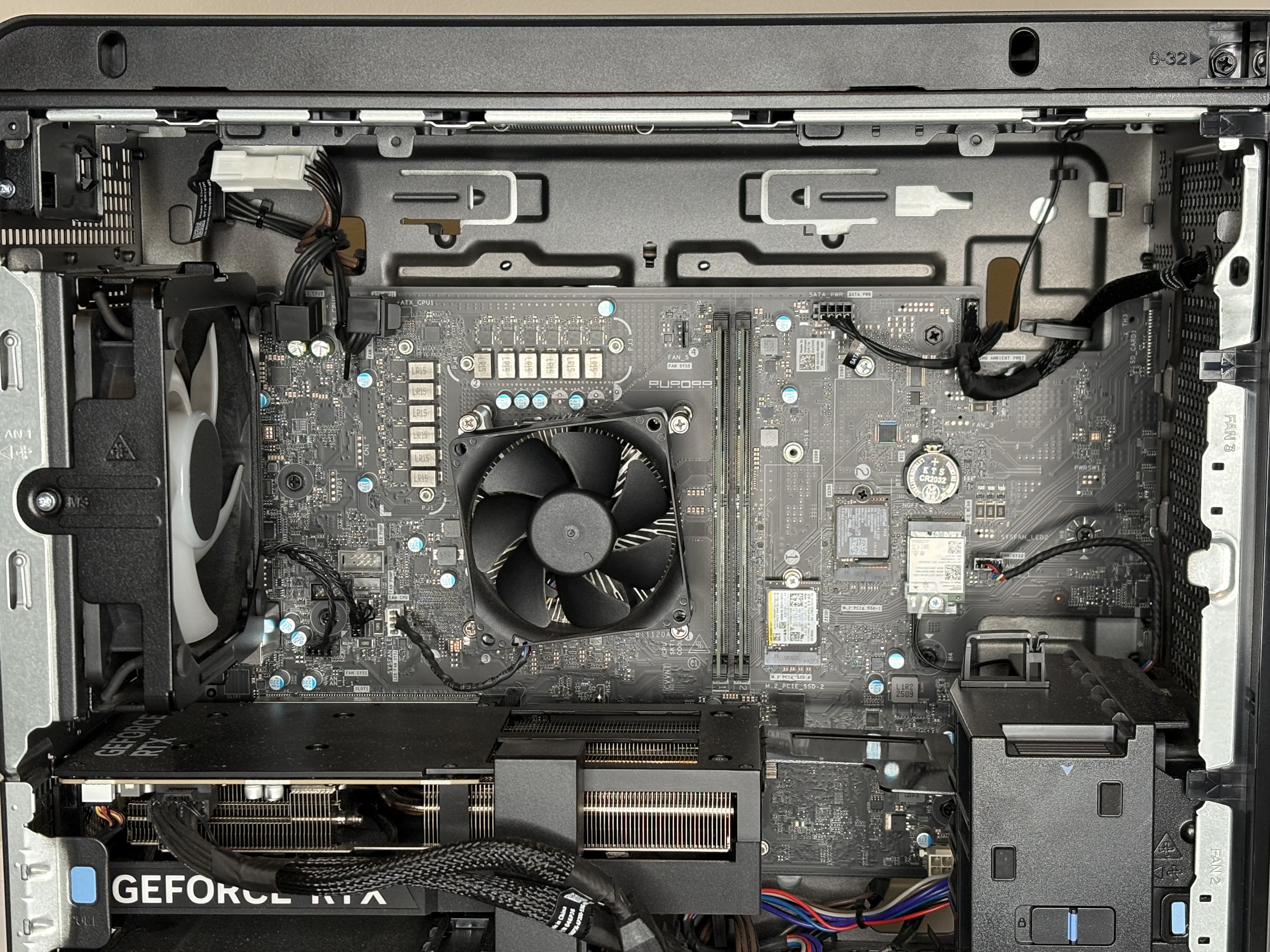 Closer view of the motherboard, memory, and main board area inside the store-bought gaming desktop